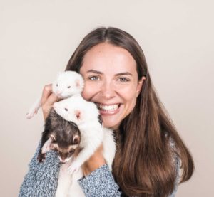 Photo of Haley Pearson of the Modern Ferret holding a ferret